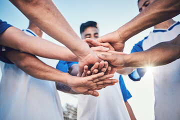 Soccer, hands together and teamwork, support and sports for training at stadium. Collaboration,...