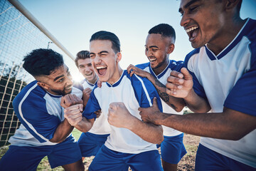 Winning, goal and soccer with team and achievement, men play game with sports and celebration on...