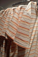 Obraz na płótnie Canvas Orange striped T-shirts collection