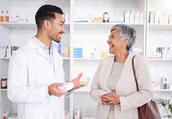 Fototapete Apotheke Pharmacist man, senior woman and talking with box, phone or funny in store for prescription, health or help. Young pharmacy manager, elderly patient and comic chat for care with customer experience