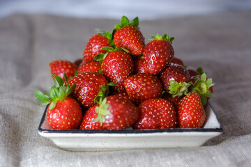 Juicy strawberries on a plate