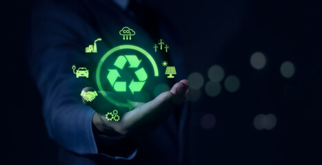 businessman holding circular economy icons Circular economy concept for future business growth and...