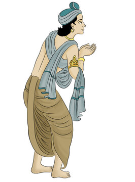 Man in Indian traditional dress praying with joined hands.