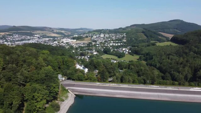 Aerial drone view of lake Hennesee near Meschede in Sauerland, Germany.