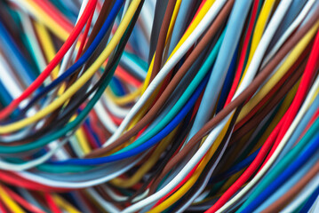 Swirl of colored electric cable in telecommunication and computer systems