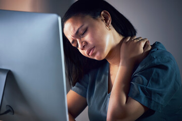 Business woman, neck pain and night in burnout, stress or fatigue by computer at office....