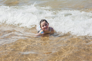 girl enjoying on the beach