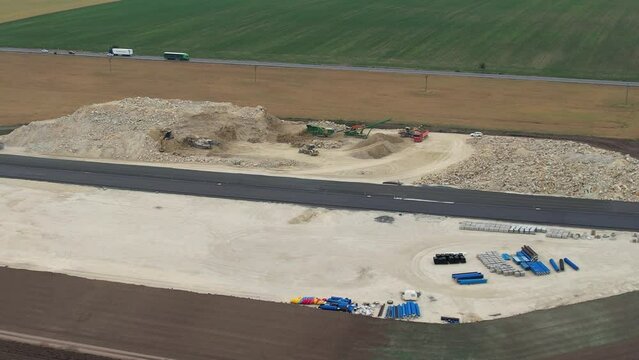  D7 motorway is a highway northwest from Prague to Chomutov and the German border,building of new highway by Louny city,speed road construction work with bridges and modern infrastructure,Czech-Europe