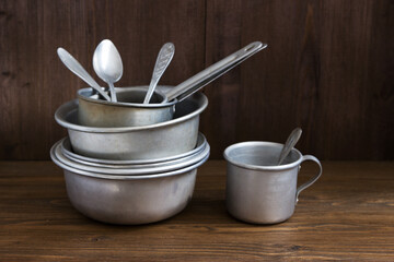 Different vintage aluminum kitchen utensils