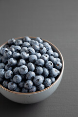 Organic Blueberries in a Bowl, side view.