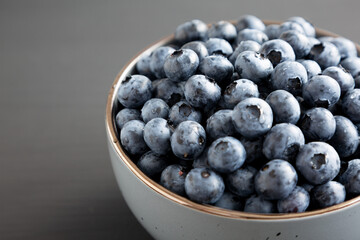 Organic Blueberries in a Bowl, side view. Close-up.