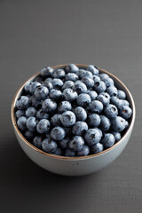 Organic Blueberries in a Bowl, side view.