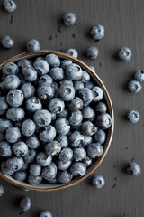 Organic Blueberries in a Bowl, top view. Flat lay, overhead, from above.