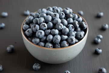 Organic Blueberries in a Bowl, side view.