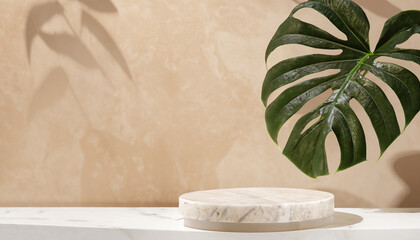 minimal white marble table top with monstera leaf for beauty product display