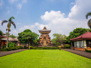 Fototapeta premium Jakarta, Indonesia (July 8, 2023): Balinese traditional house located on the Balinese pavilion in Taman Mini Indonesia Indah.