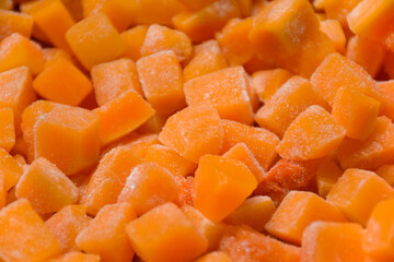 Roughly cut in cubes frozen butternut squash background