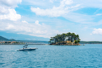 Obraz na płótnie Canvas Small rocky island on the Rajska beach on the Rab island in Croatia