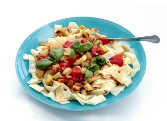 pasta with vegetables,tomato suace  and meat as  lunch meal close up
