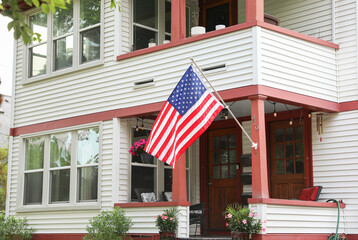  US flag waving proudly, representing patriotism and the spirit of American holidays, evoking a...