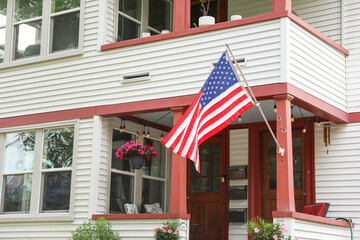  US flag waving proudly, representing patriotism and the spirit of American holidays, evoking a...