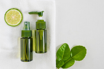 Kaffir Lime and shampoo product for Maintain shiny hair, cure hair loss symptoms. flat lay design.