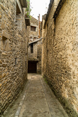 Narrow medieval street in the old town. Boltaña, Huesca (Aragón-Spain)