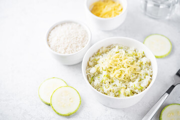 Zucchini cheese rice in a bowl