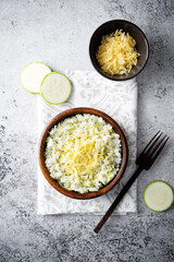 Zucchini cheese rice in a bowl