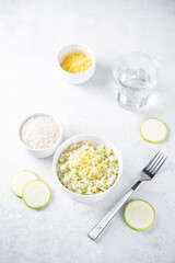 Zucchini cheese rice in a bowl