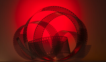 abstract colored cinematic background with film strip.background banner for film premiere festivals...