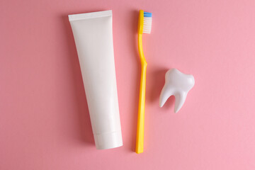 Oral hygiene products on a colored background with space for text 