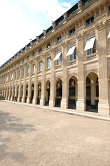 Fototapeta na wymiar The facade at the Palais Royal garden. Paris, France.