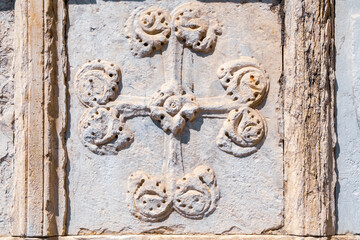 detail of coats of arms in stone