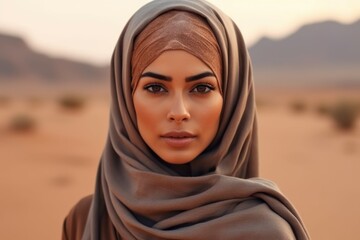 Woman in the desert. Background with selective focus and copy space. AI generated, human enhanced