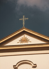 golden cross on the church