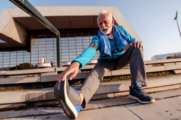 Man relaxing after workout outdoors