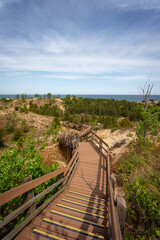 Indiana Dunes National Park with foot path, trees and Lake Michigan