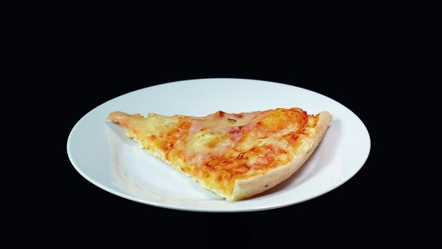 Pizza spinning on a plate