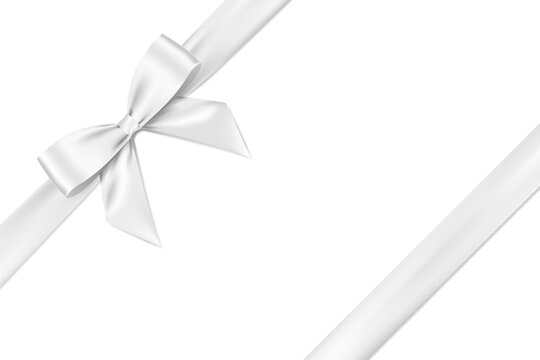 White bow realistic shiny satin and ribbon place on left corner