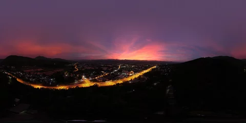 Zelfklevend Fotobehang Amazing Aerial view 360 spheres panoramic of the hillside town during dusk with the dark mountains at the countryside of Northern unseen Thailand © Tanongsak