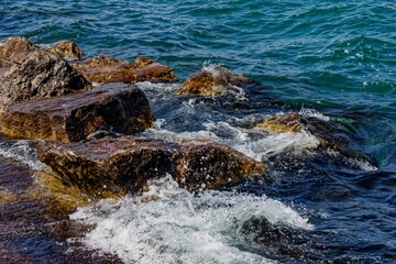 Boulders serve as breakwaters on the shores of Lake Michigan