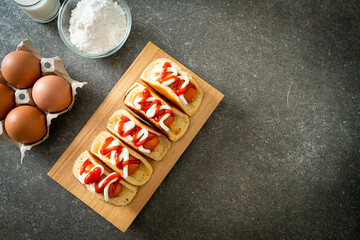 flat pancake roll with sausage