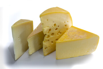 Different types of cheese on white background