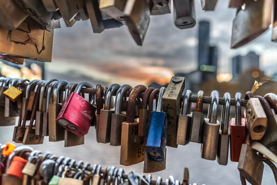 Melbourne, Victoria, Australia - Padlocks attached to a fence as a sign of eternal love