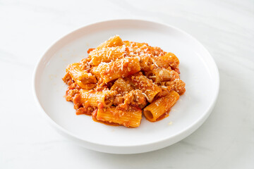 Rigatoni pasta bolognese with cheese