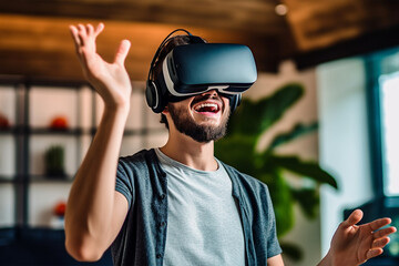 excited man in virtual reality headset gesturing while playing game at home