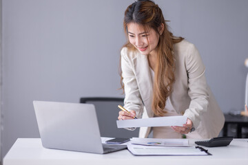 Business Documents, Auditor businesswoman checking searching document legal prepare paperwork or report for analysis TAX time, asian accountant Documents data contract partner deal in workplace office