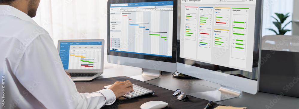 Poster project manager planning schedules for business task on office using gantt chart software display on