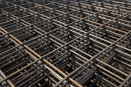 Steel Rebars for reinforced concrete. steel wire mesh for concrete slab reinforcement of construction. Background and banner